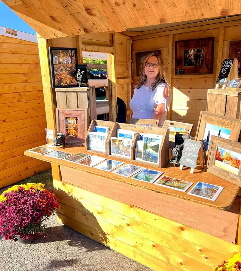 Okanagan Images owner Donna Fazan at market stand